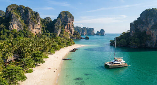 Limestone cliffs and turquoise water at Railay Beach, Krabi